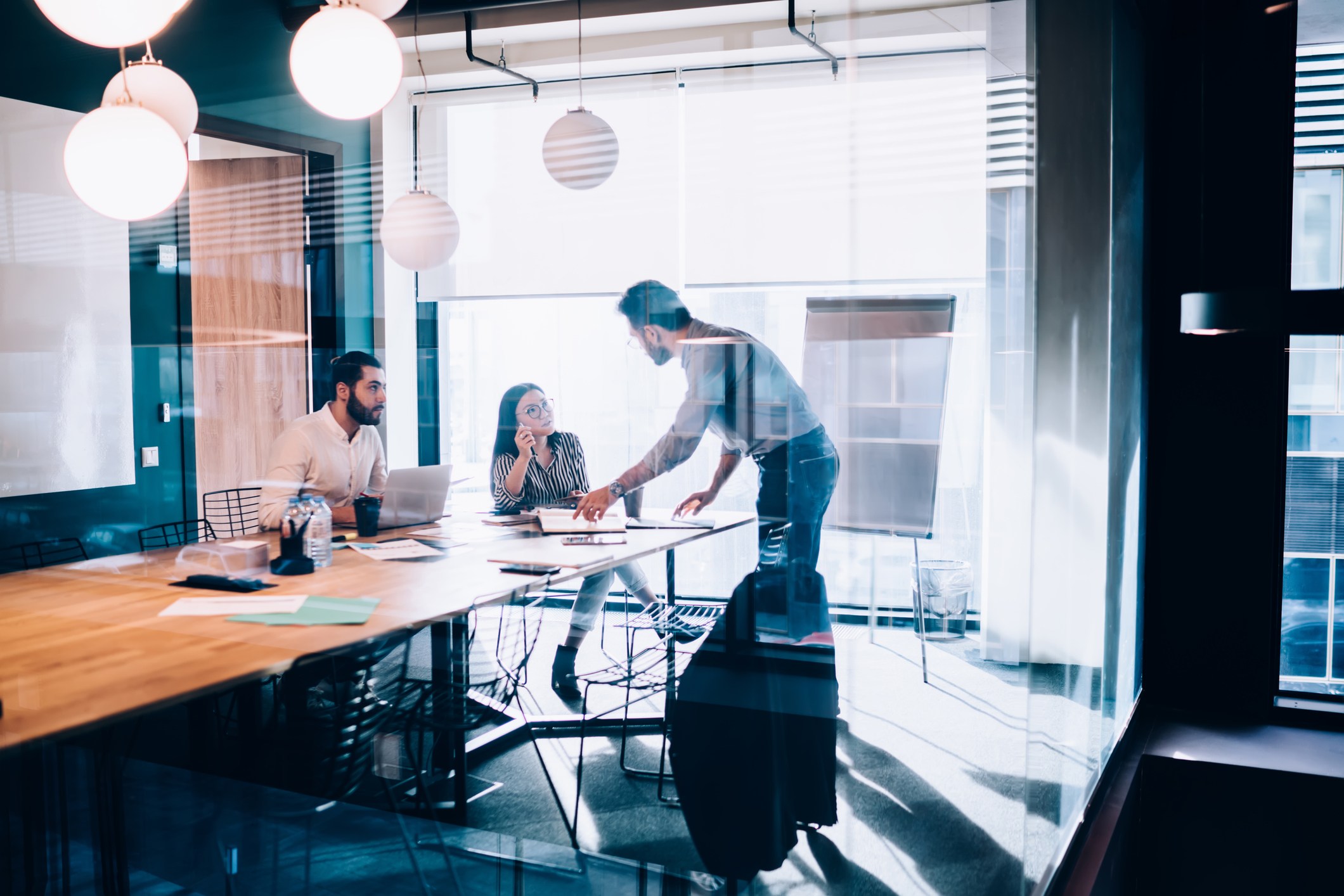 Business people sharing ideas in conference room